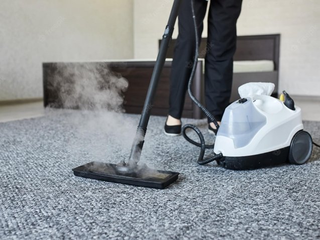 carpet-flat-with-professional-steam-cleaner-equipment